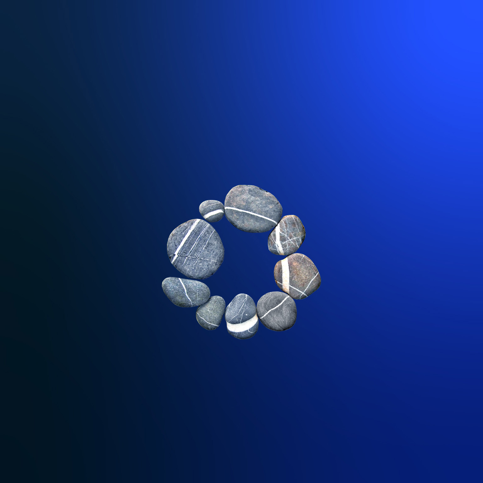 A circle made up of nine smooth, gray river stones sits on a dark blue gradient. Each stone contains a white vein, forming a secondary circle when they are arranged in this way.